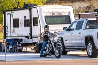 biker and RV at our Medina River RV park